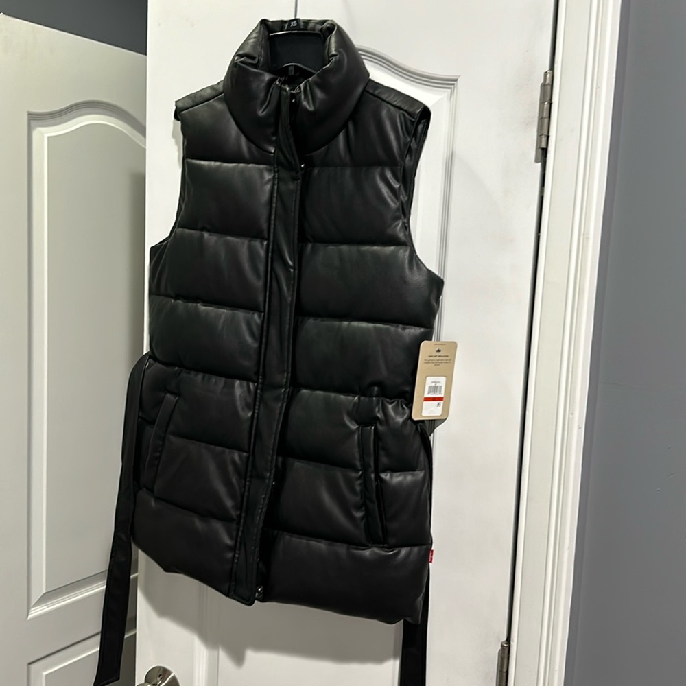 Brand new with tags. Levi’s long black leather belted vest. XS